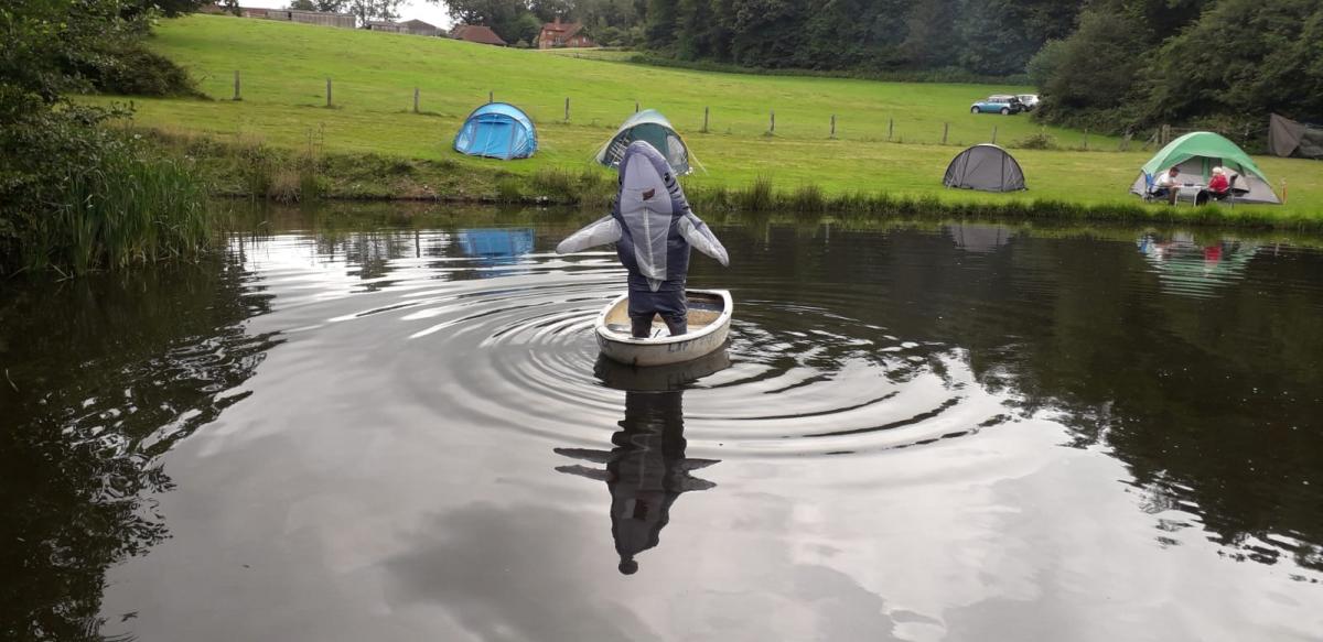 015 - Sharkpeople in a boat